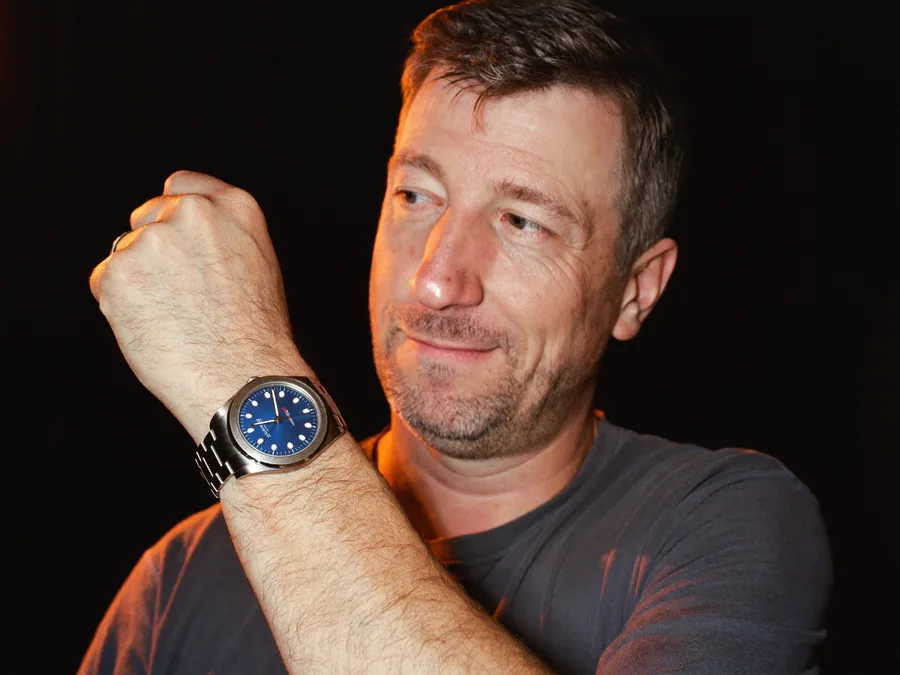 Daniel R. wearing the Omega Seamaster he won